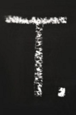 T.